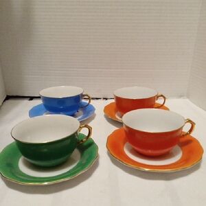 Vintage Gold Castle 1950 Porcelain Teacup and Saucer Set - Green, Blue, Orange